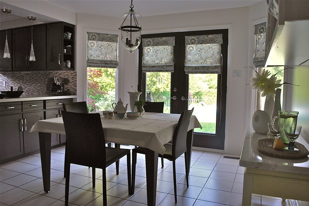 Black Kitchen Cabinets in a light-Filled Space