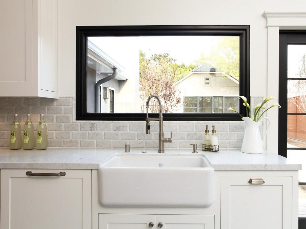 Black and White Kitchen With Organised Soap Dispensers